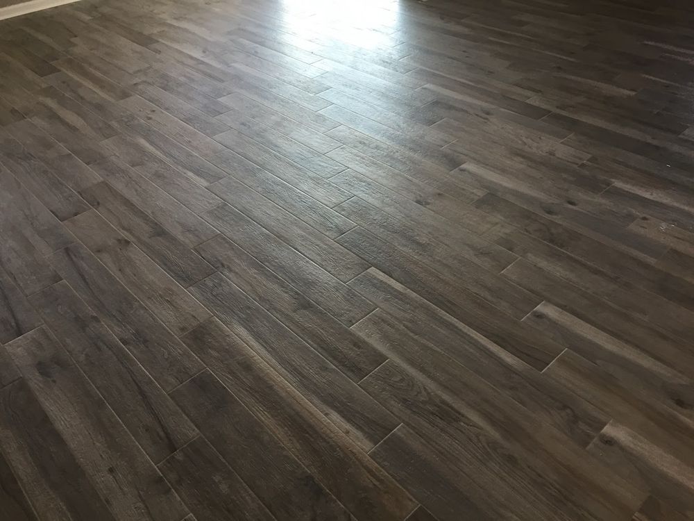 Transform your home with our expert flooring services. We offer high-quality materials and professional installation, ensuring durability and style to enhance any room’s aesthetics and functionality. for Strictly Custom Tile Inc. in Middleburg, FL