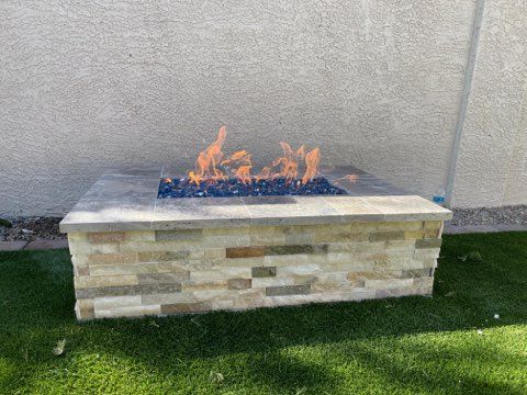 Enhance your outdoor living space with our expert Outdoor Kitchens and Fireplaces service, creating a perfect blend of functionality and style for memorable gatherings and ultimate relaxation in your backyard. for Ruiz Patio Designs in Phoenix, AZ