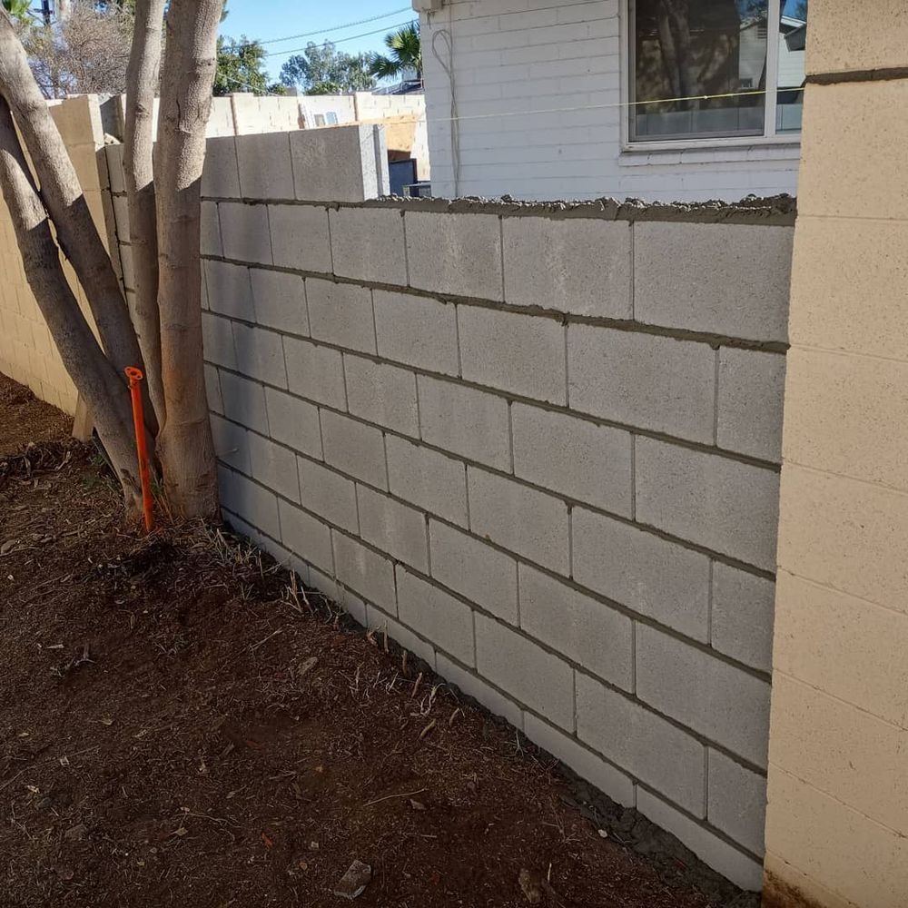 Enhance your outdoor space with our natural stone hardscape service, offering durable and beautiful solutions like patios, walkways, and retaining walls to transform your landscape into a timeless masterpiece. for CRAJE Landscaping LLC in Mesa, AZ