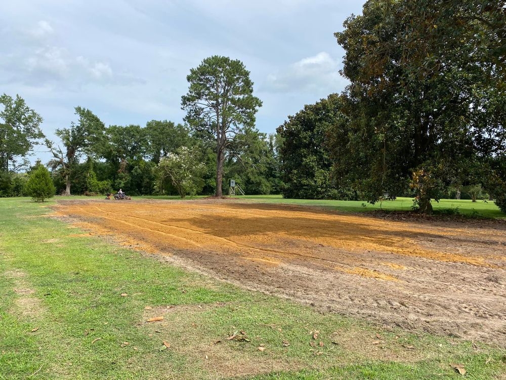 Our stump grinding service efficiently removes tree stumps from your yard, enhancing aesthetic appeal and safety while preventing pest infestations, ensuring your landscape remains beautiful and well-maintained. for Donnie's Tree Services in Wilson, NC