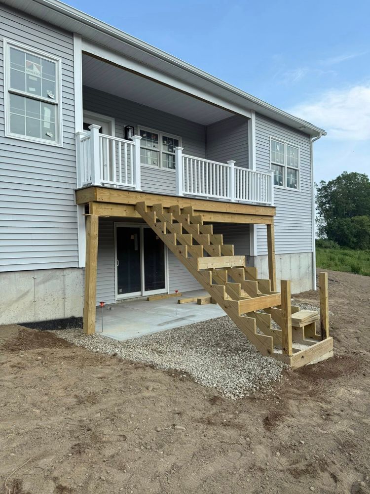 Enhance your outdoor space with our durable and stylish composite wood gates, offering low maintenance beauty and robust security. Perfect for homeowners seeking an attractive, sustainable solution for their landscaping needs. for Cardinal Landworks LLC in Canterbury, CT