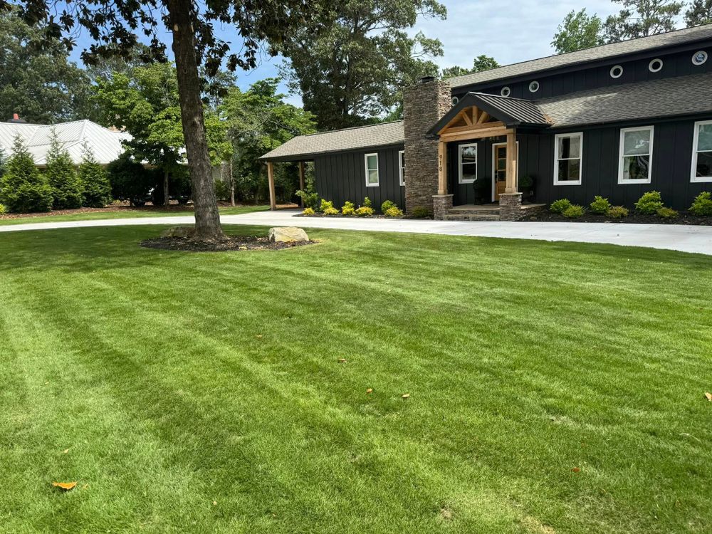 Our Warm Season Aeration service includes the core aeration of your lawn during the growing season, promoting healthier grass roots and improved water absorption for a vibrant and lush yard. for Allatoona Turf in Woodstock, GA