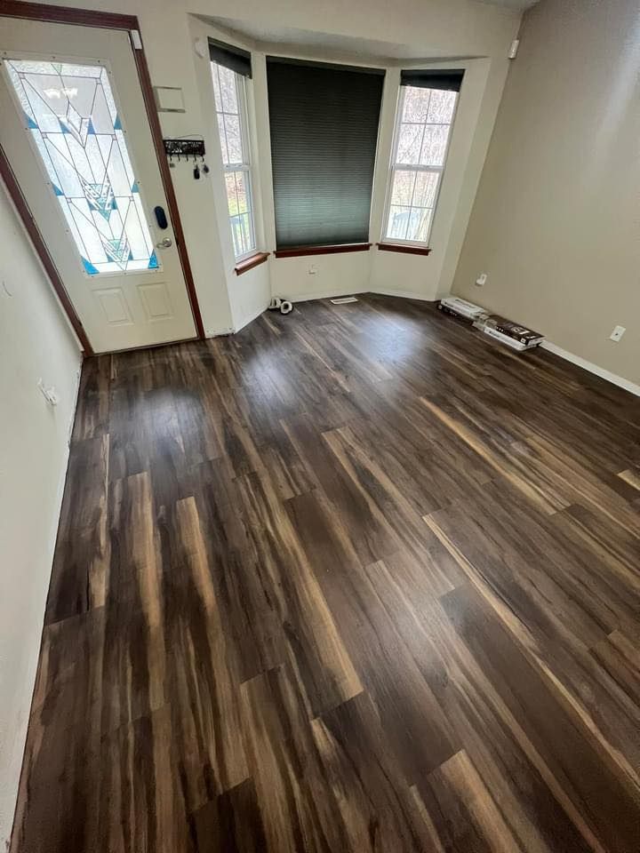 Revitalize your home with our top-notch flooring service. From hardwood to tile, we provide expert installation and quality materials to enhance the beauty and value of your space. for Mirror Image Home Repair & Remodeling Services in Bangor, MI