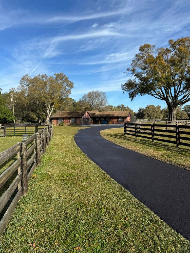 Transform your home's curb appeal with our professional Asphalt Driveway Installation service, offering durable, smooth surfaces that enhance longevity and aesthetics while providing a cost-effective solution tailored to your needs. for Pavesheild in Haines City, FL