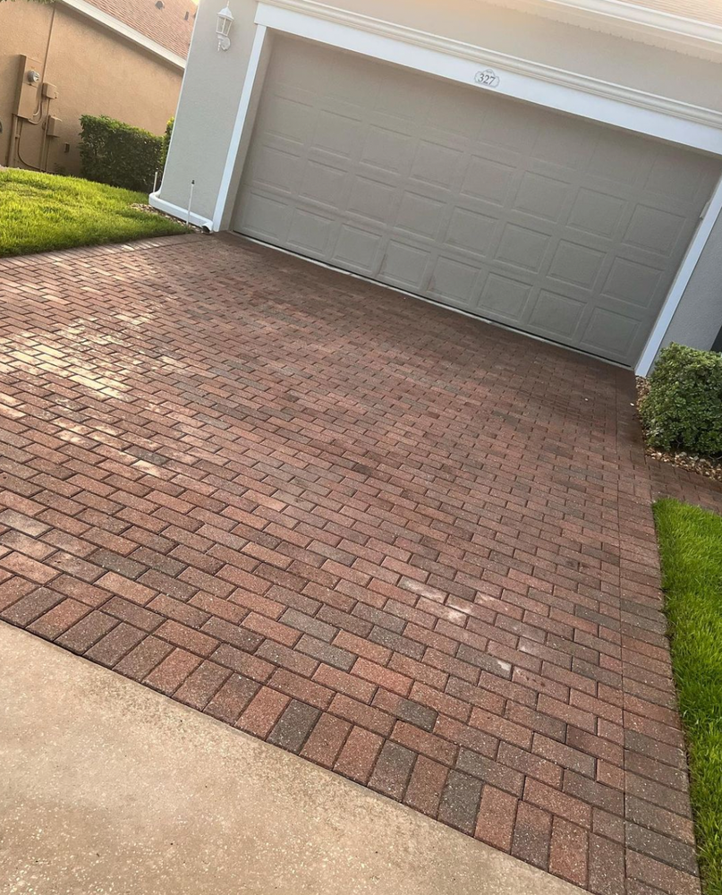 Our Driveway and Sidewalk Cleaning service ensures a clean and spotless driveway and sidewalk, eliminating dirt, grime, stains to enhance the overall appearance of your home. for WSL Cleaning in Orlando, FL