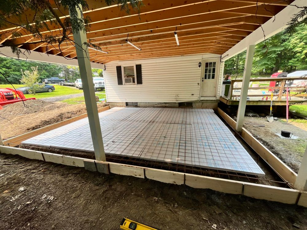 Our Concrete Slab Construction service provides durable, expertly crafted foundations for homes. We ensure quality and precision, enhancing stability and longevity for your property's construction needs. Trust us to build a solid foundation. for LeClaire Flatworx in Bomoseen, VT