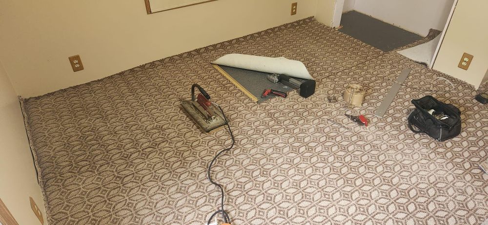 Our Re-stretching & repairs service ensures your flooring remains in excellent condition and saves you money by fixing any issues such as sagging or tears. for Cut a Rug Flooring Installation in Lake Orion, MI