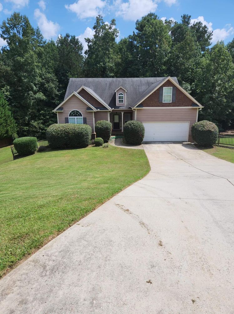Our Aeration and Overseeding service is a proven method to improve soil health, reduce thatch build-up, enhance lawn growth, and promote lush grass coverage for a healthier, more beautiful yard. for Deeply Rooted Lawn Installations - Sod Installation & Hydroseeding Services in Winder, GA