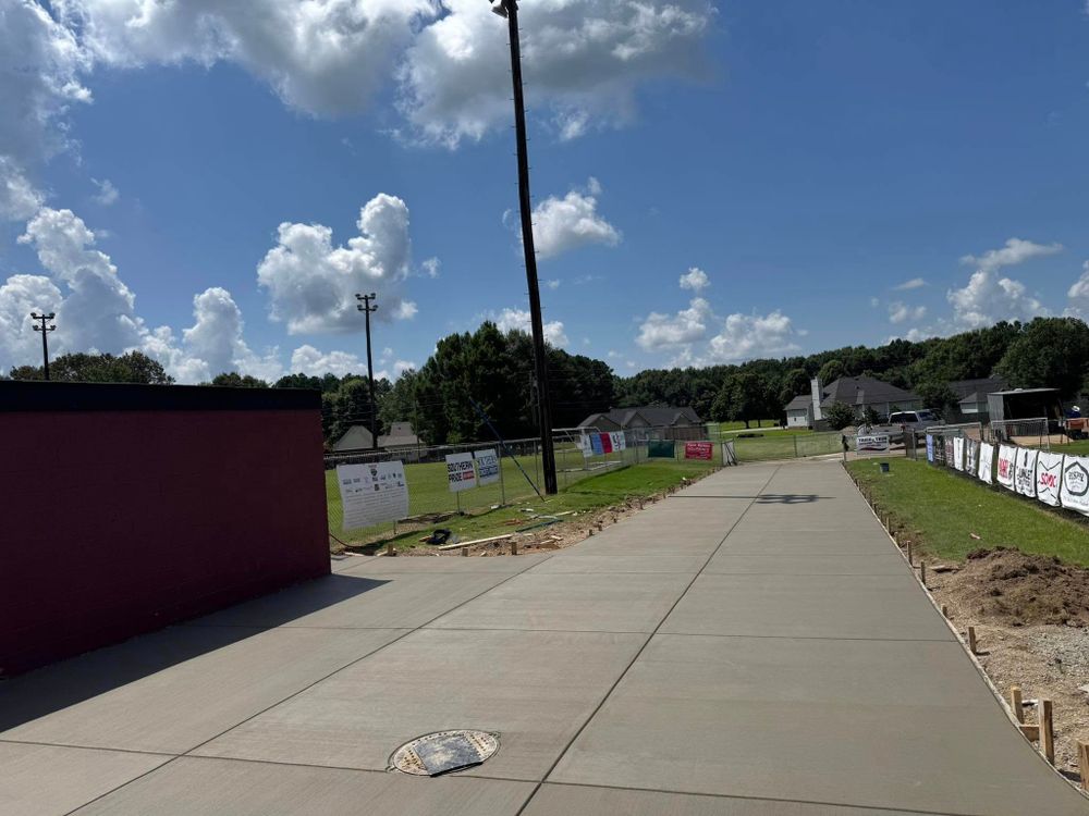 Our Cutting and Coring service offers precise concrete modifications for residential projects, ensuring clean cuts and accurate coring to accommodate plumbing, electrical installations, or remodeling needs with minimal disruption. for Ramsey Concrete Construction in Covington, TN