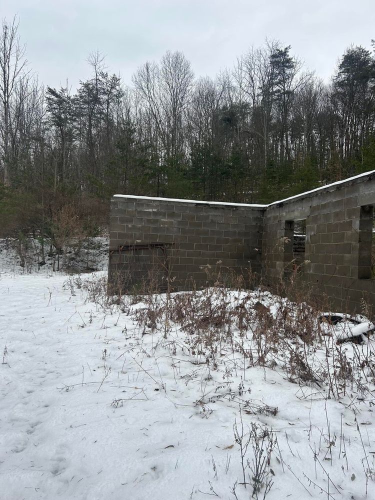 Discover what land clearing is: Our Land Clearing & Demolition service efficiently removes unwanted vegetation and structures to prepare your property for new projects while ensuring safety and environmental responsibility. for Pine Mountain Restoration, LLC Excavation and Fencing Contractor in Howard, PA
