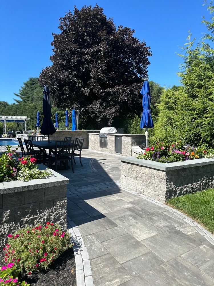 Transform your backyard with a custom outdoor kitchen designed for cooking, entertaining, and lasting beauty. We create functional, stylish spaces that seamlessly blend with your landscape and hardscape design. for The Lawn Guy in Saratoga Springs, NY