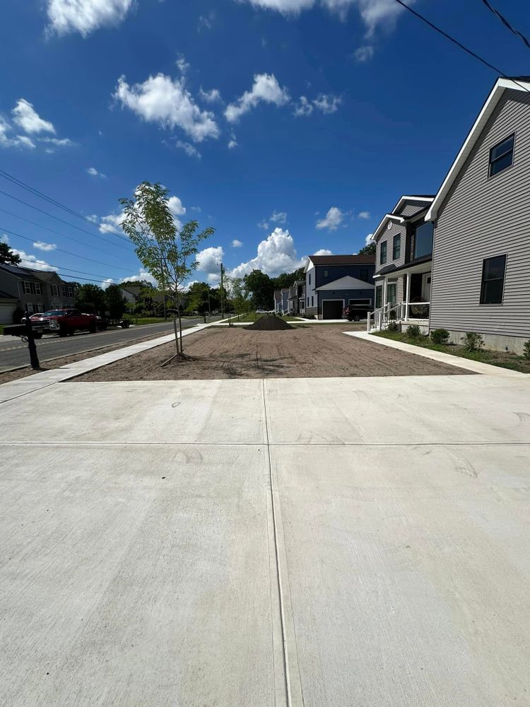 Enhance your home's curb appeal with our expert driveway design & build services, offering durable and aesthetically pleasing stone driveways tailored to complement any landscape for a stunning first impression. for GT Lawn Care in Egg Harbor Township, NJ