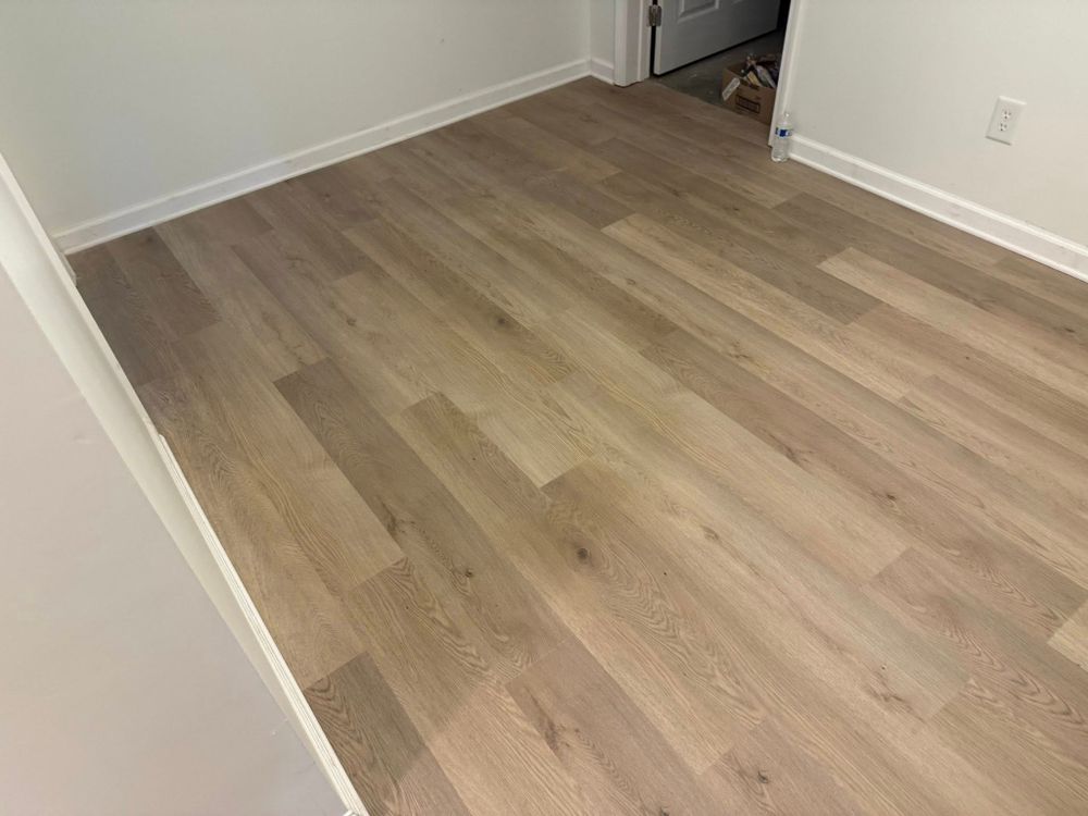 Transform your home with our expert vinyl floor installation service, offering precision and elegance in every detail. Enjoy durable and stylish flooring solutions tailored to fit your unique space. for Hardwood Renovations in Buford, GA