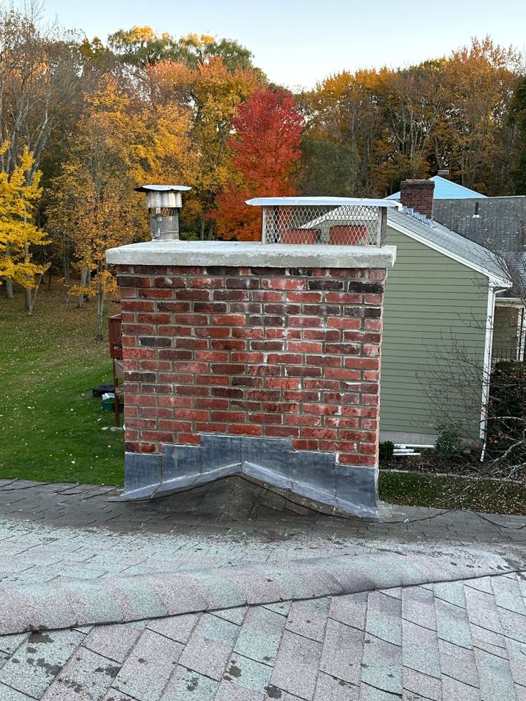 Chimney photos from restoration to new builds for All For U Roofing & Masonry in Boston, MA