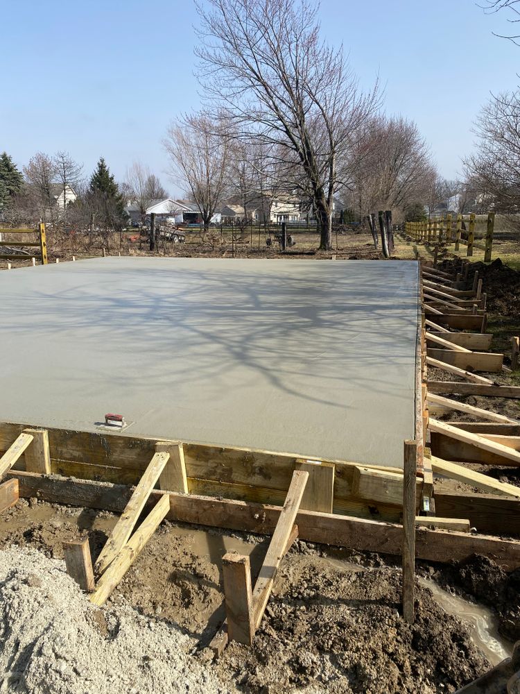 Our Floors service provides homeowners with high-quality concrete flooring solutions that are durable, easy to clean, and versatile in design options for a modern and stylish aesthetic. for Paul Turner Concrete & Excavating in Toledo, OH