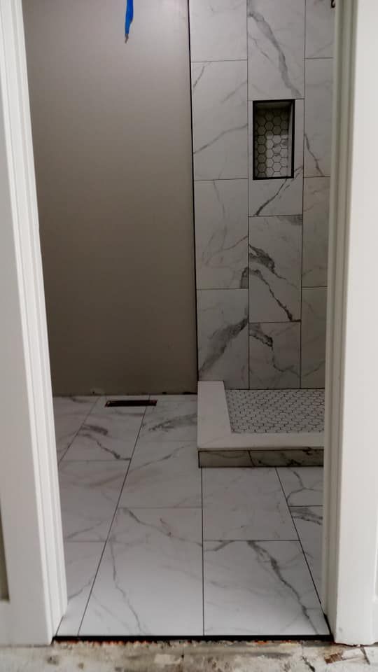 Upgrade your home with our Hard Surface Tiles service. Our expert team provides professional installation, ensuring durable and stylish tiles to enhance the beauty of your floors or walls. for I-69 Tile in St. Clair County, MI