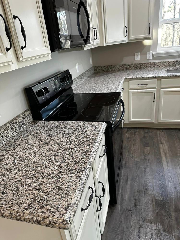 Revitalize your kitchen and cabinets with our refinishing service, bringing new life to your space through expert painting techniques that enhance durability, aesthetic appeal, and overall home value. for G Ochoa Painting LLC in Claremont, NC