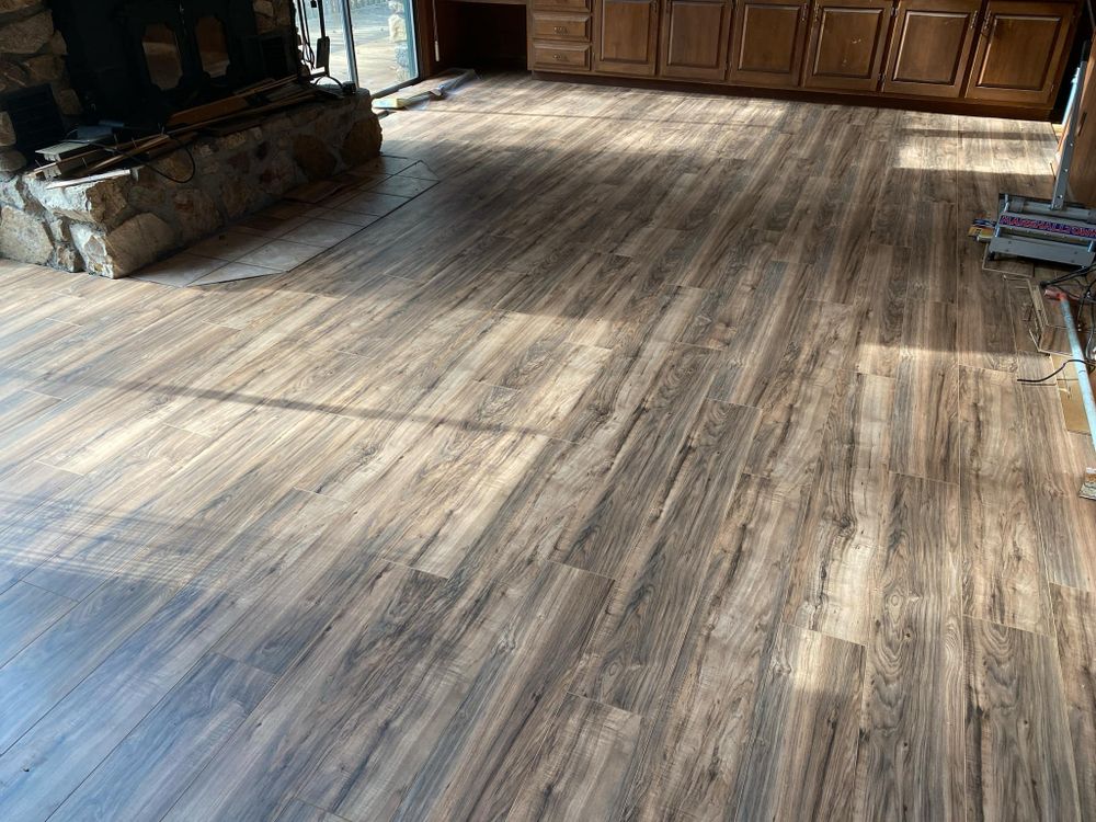 Our LVP service offers homeowners durable, stylish, and cost-effective luxury vinyl plank flooring that mimics natural wood or stone. It's easy to maintain, water-resistant, and perfect for any room in your home. for Catawba Valley Flooring in Conover, NC