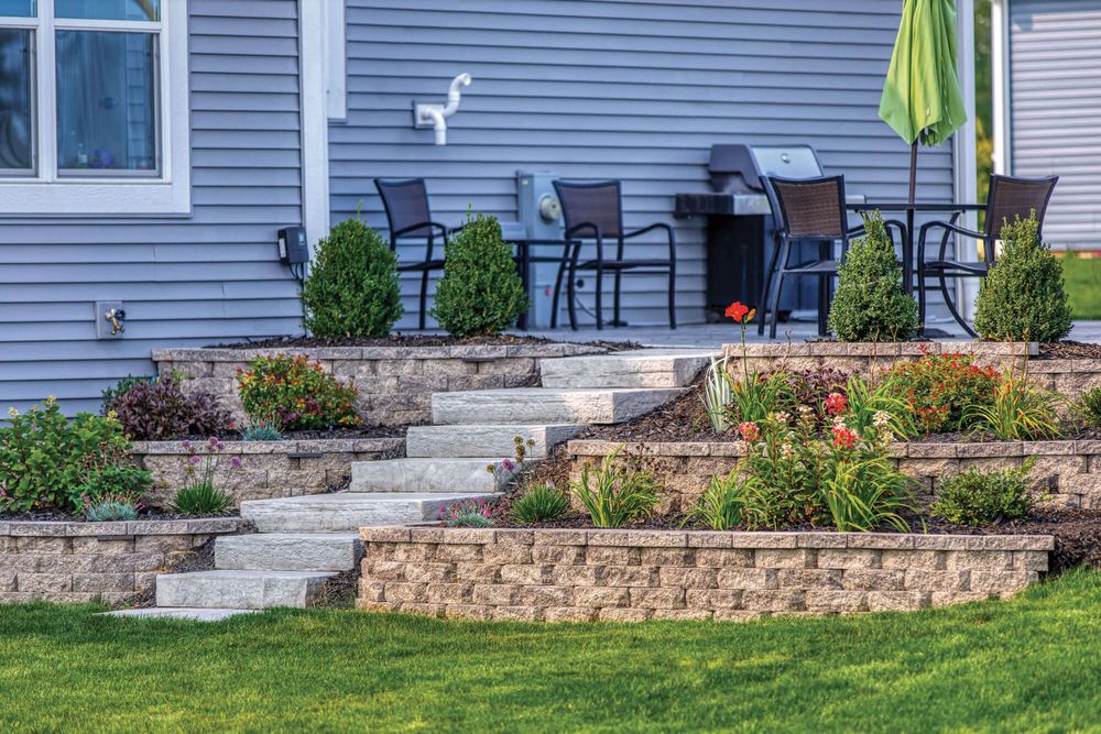 Enhance your outdoor space with our Small Hardscape Projects service, where we create beautiful and functional features like patios, walkways, and retaining walls to enhance your landscaping. Satisfaction guaranteed! for Nate's Lawn Services in Braidwood, IL