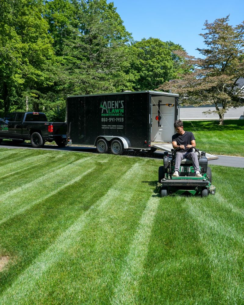 Our professional mowing service provides consistent maintenance for your lawn, ensuring a neat and polished appearance. Trust us to keep your outdoor space looking pristine all year round. for Adens Lawn Maintenance LLC  in Old Lyme, CT