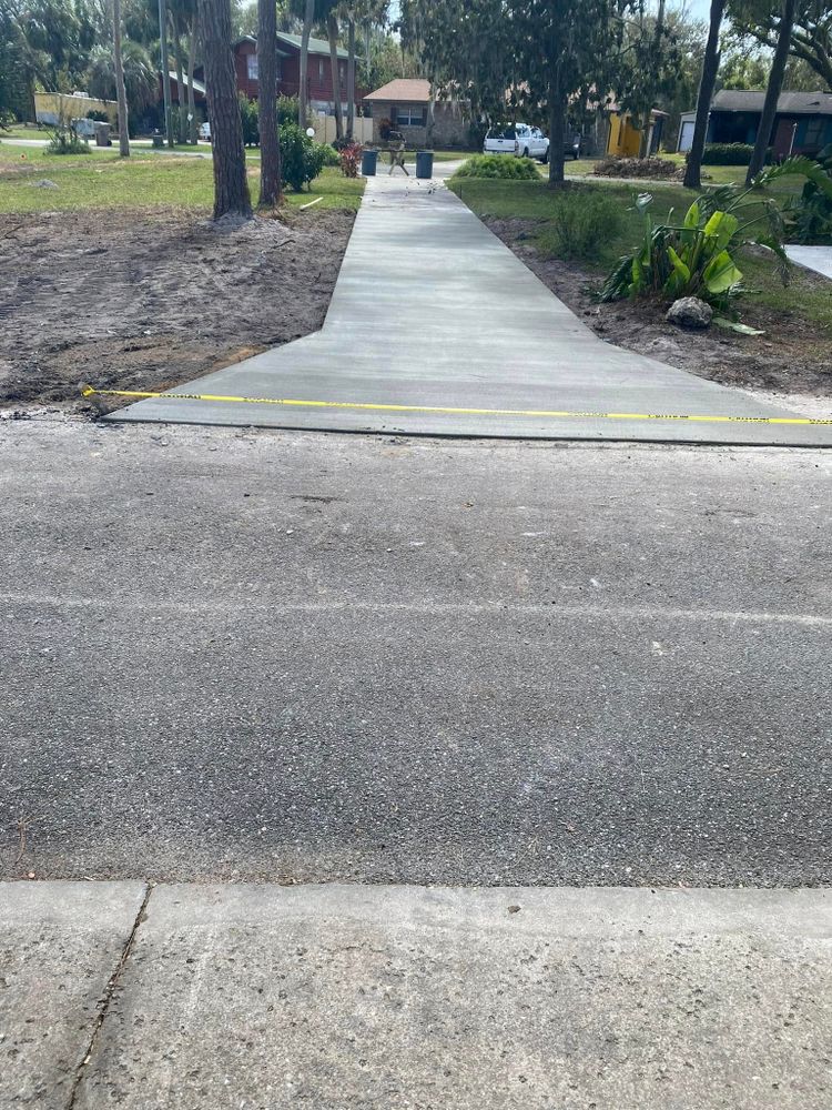 Enhance your home with our expert driveway construction services, offering durable, aesthetically pleasing designs. We prioritize quality and customer satisfaction to create driveways that perfectly complement your property’s curb appeal. for Walsh Fencing & Land Management in Tavares, FL