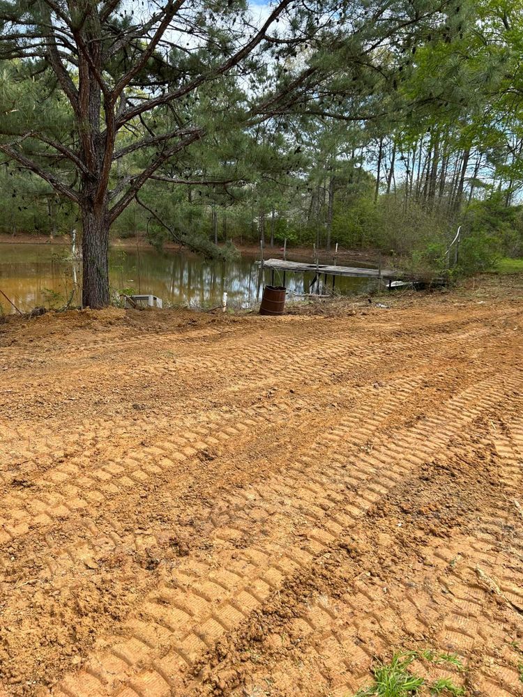 Our Land Clearing service efficiently removes trees, brush, and debris from your property to prepare for construction or landscaping projects, ensuring a clean and safe work area. for Kountry Construction in Brookhaven, MS