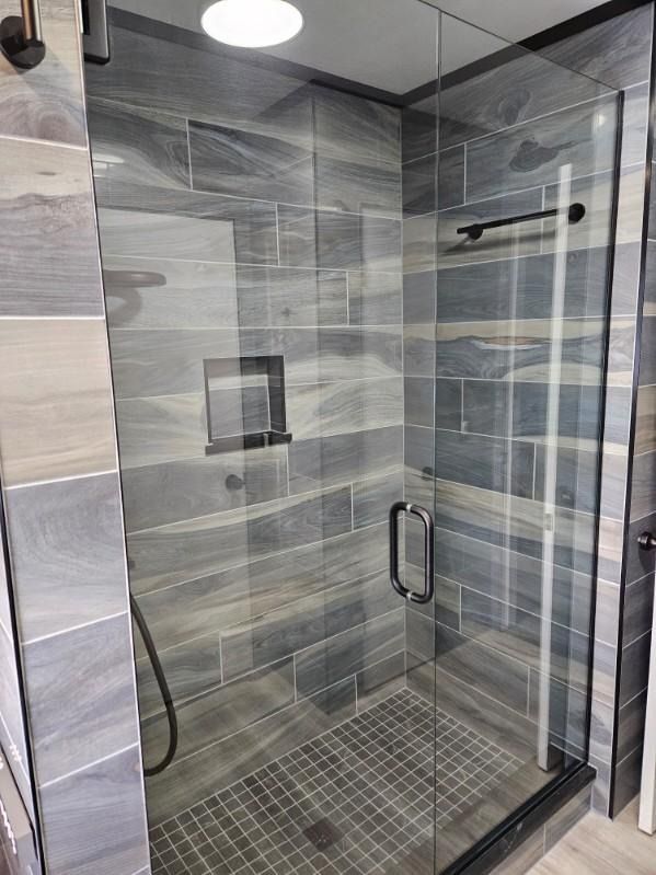 Enhance your home with our expert bathroom renovation service, offering customized designs, quality craftsmanship, and seamless installations to transform your space into a beautiful and functional oasis. for Kearns Construction in Cadillac, MI