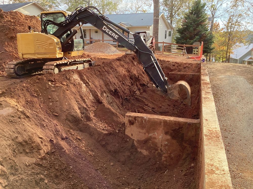Our excavation service offer fast and efficient excavating for all your underground needs. From basements and footers to ponds and lakes we make reality to your vision with expert care. for Allred Construction in Heflin, AL