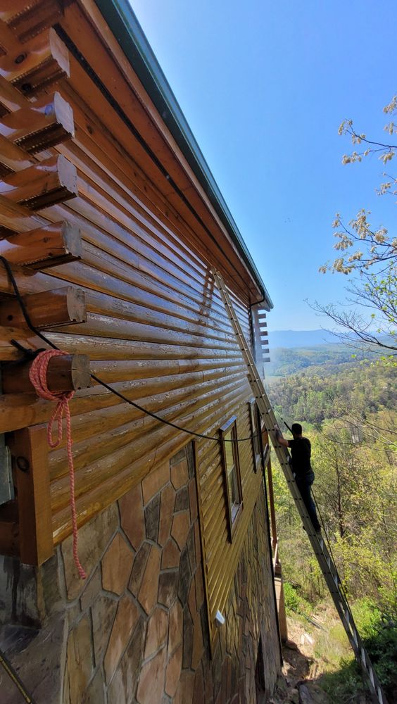 Enhance your cabin's beauty and longevity with our professional painting and staining service, ensuring protection from the elements while maintaining a stunning, polished look that complements your home's natural surroundings. for Starkeys Home Improvement and Cabin Maintenance in Sevierville, TN