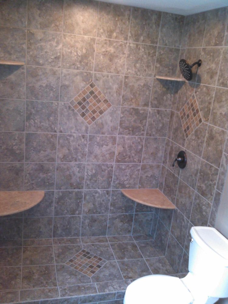 Transform your home with our expert tile work services. From elegant floors to stunning backsplashes, we offer precise craftsmanship using high-quality materials to enhance beauty and functionality in every room. for Top Tier Construction in Evansville, IN