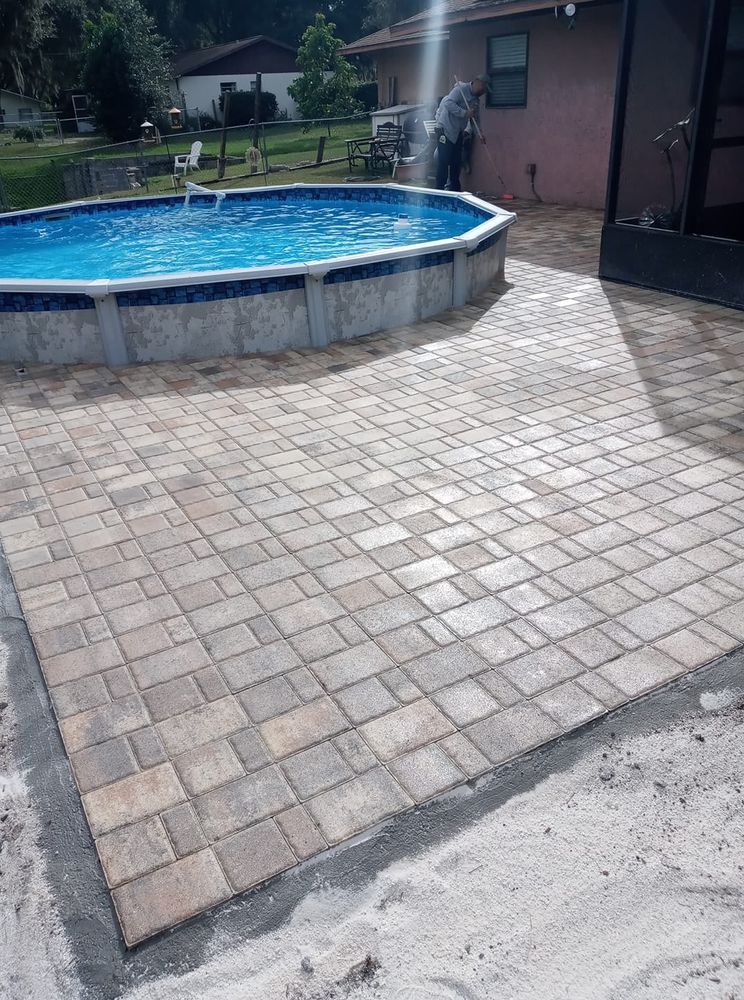 Transform your outdoor space into a beautiful and functional patio oasis with our expert Patio Design & Installation service. Enhance your home with durable concrete solutions tailored to fit your style and needs. for True Additions in Lake Panasoffkee,  FL