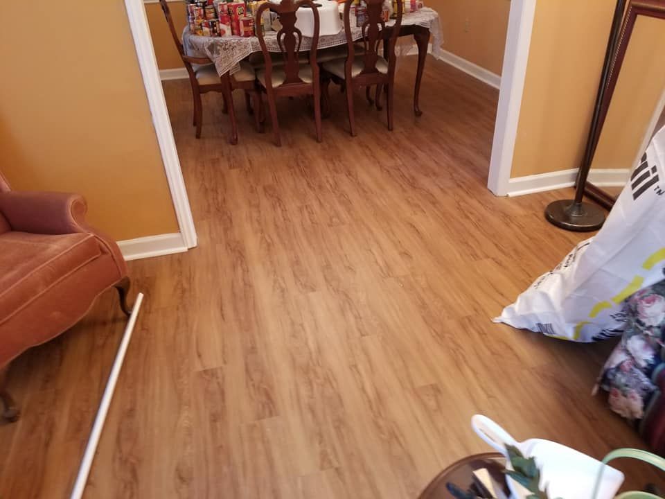 Transform your home with our expert flooring service, offering a range of materials and styles to enhance any space. Enjoy durable, beautiful floors crafted precisely to meet your needs and preferences. for Autry Home Improvements LLC in Monroe, NC