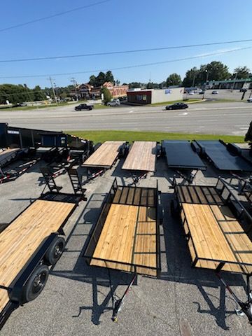 Enhance your property with our versatile trailers, designed to meet all transport needs. Our durable trailers offer reliable performance and are perfect for hauling equipment or supplies efficiently and safely. for Ryan's Trailer Carport Sales in Whiteville, NC