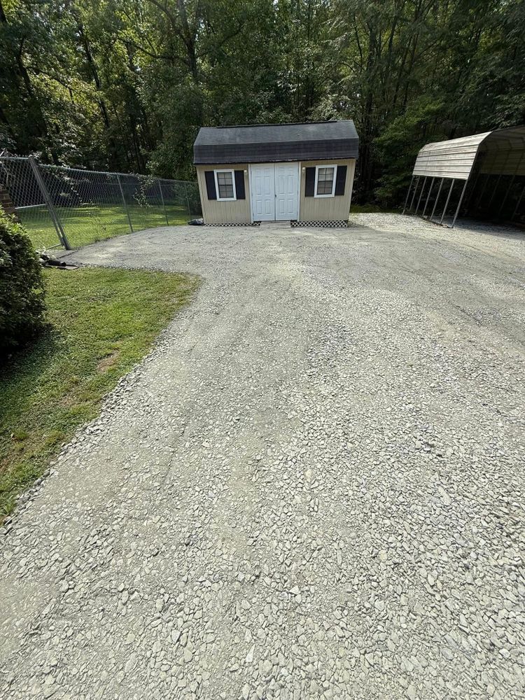 Our Roadbeds service offers professional construction and preparation of durable, stable road foundations, ensuring safe and smooth access to your property. We prioritize quality materials and expert engineering for long-lasting results. for Advantage Rental And Services in Youngsville, NC