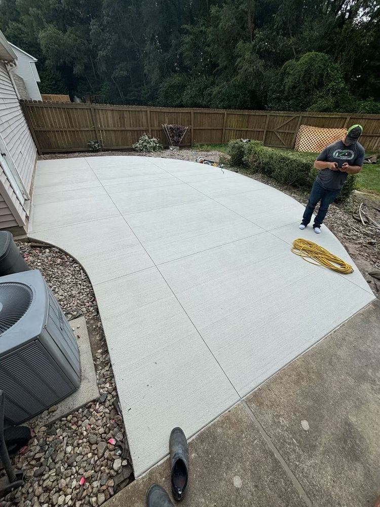 Transform your outdoor spaces with our superior concrete service, expertly crafting durable driveways, sidewalks, and patios that enhance your home's aesthetic appeal while ensuring long-lasting strength and functionality. for Curb Concepts Plus in Mishawaka, IN