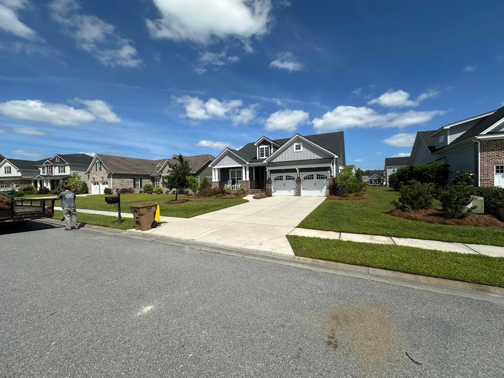 Enhance your home's curb appeal with our professional pressure washing service, expertly removing dirt, grime, and stains from driveways, sidewalks, decks, and siding for a fresh and revitalized look. for Beasley’s Lawn Care Services in Guyton, GA