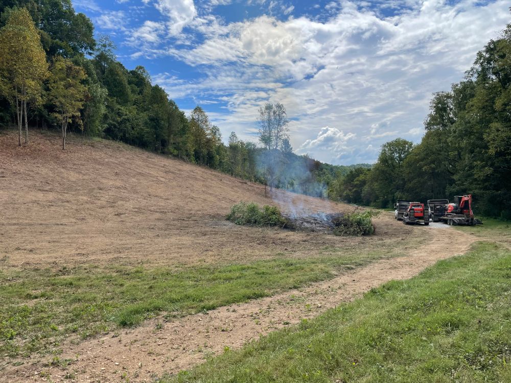 Our Land Clearing service efficiently clears overgrown land by completely removing trees and underbrush, allowing for a "fresh start" for your property, whether preparing to build your dream home or making way for new grasses to grow for your farm. for TrottCo Excavation in Shelbyville, TN