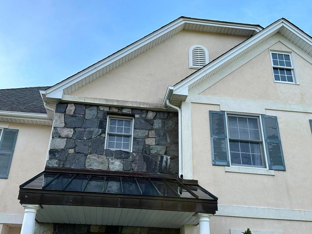 Our Home Softwash service uses a gentle yet effective cleaning method to eliminate dirt, grime, mold, and mildew from your home's exterior surfaces without causing any damage. for America First Power Washing Services in Brewster,  NY