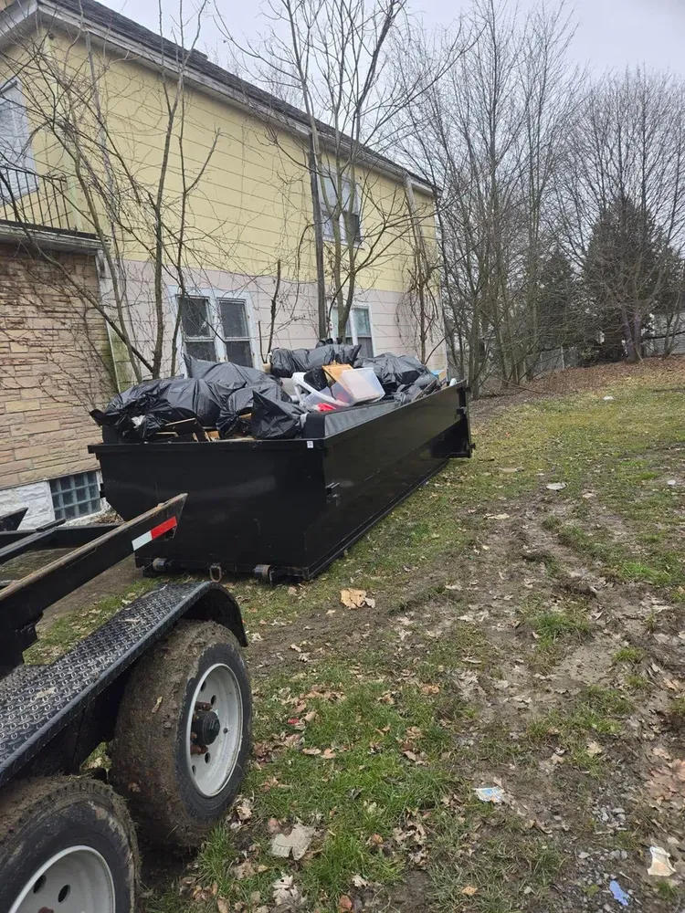 Streamline your landscaping projects with our convenient dumpster rentals. Perfect for debris removal and yard clean-up, our service ensures a hassle-free experience while transforming your outdoor space. for Hauser's Complete Care INC in Lancaster, NY
