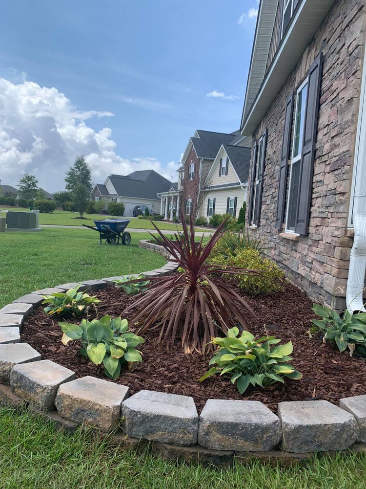 Mowing for All in One Landscaping in Jacksonville, NC