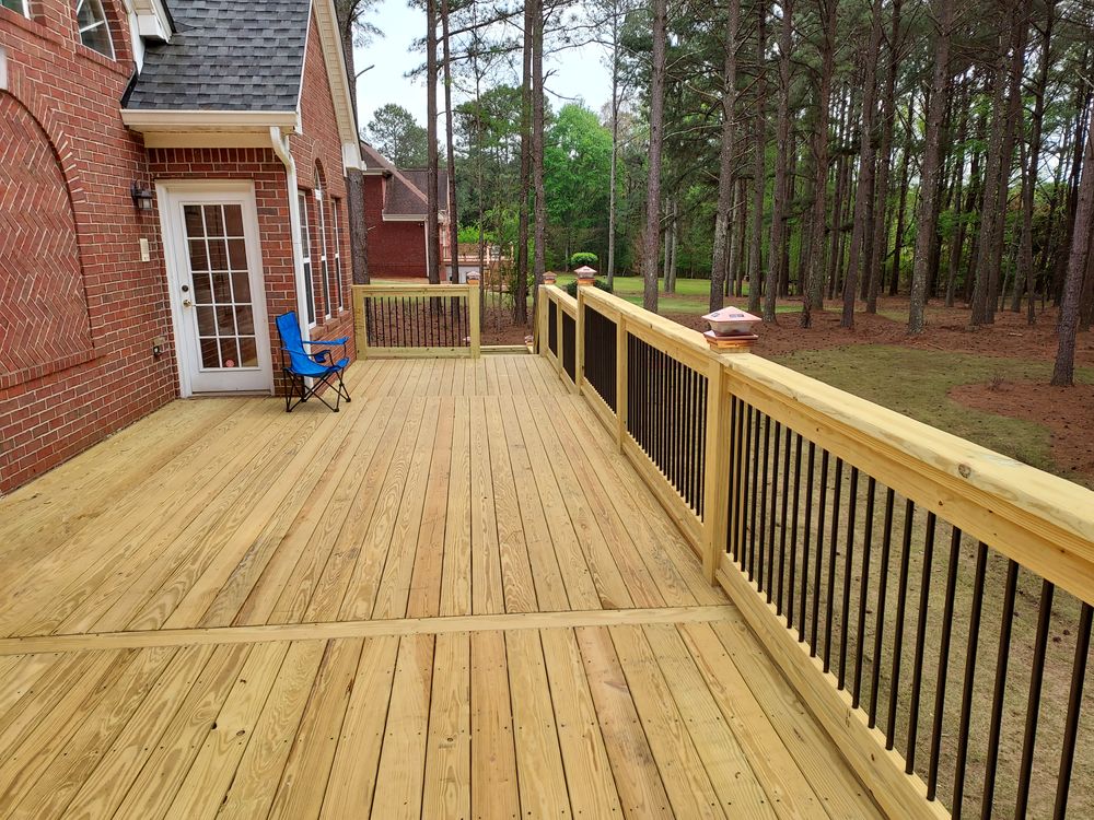 Enhance your outdoor living space with our custom decks, tailored to fit your style and needs. Our skilled carpenters ensure quality craftsmanship for durable, beautiful decks designed uniquely for your home. for South Atlanta Carpentry in Atlanta, GA