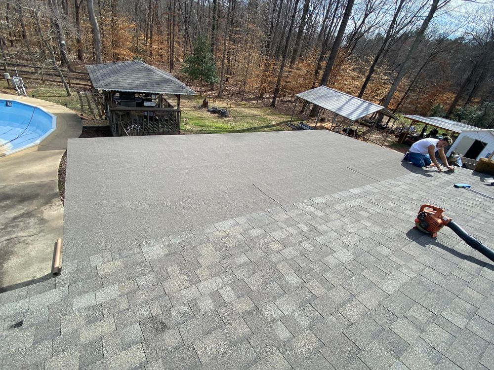 Our Flat Roof service provides durable and cost-effective solutions for homes, utilizing high-quality materials like metal roofing to ensure long-lasting protection against the elements. Trust us with your roof today! for Mars Roofing & Home Improvement LLC in Monroe, NC