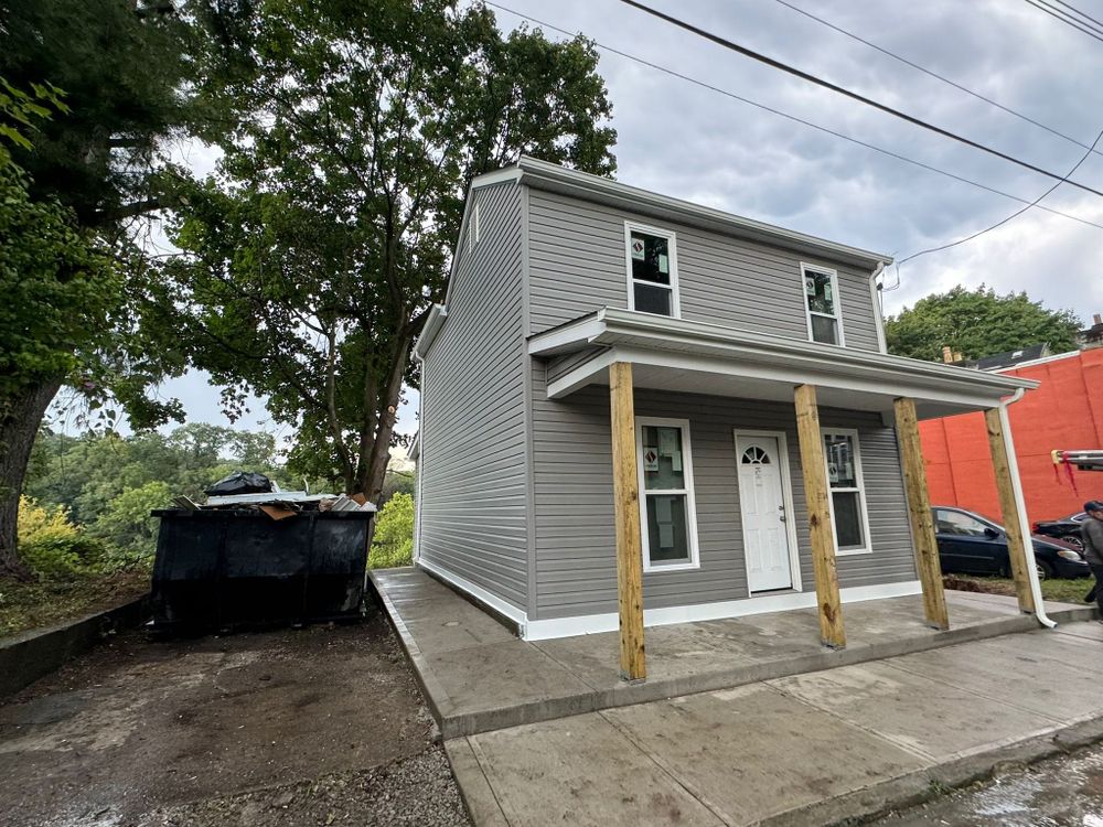Transform your vinyl siding house with our expert siding services, enhancing curb appeal and energy efficiency while ensuring durability and style tailored to meet your home's unique aesthetic needs. for Spanbauer Construction LLC in Murrysville, PA