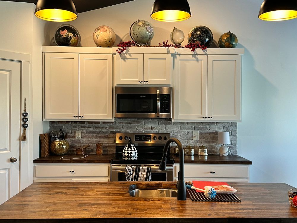 Revitalize your kitchen and cabinets with our refinishing service, bringing new life to your space through expert painting techniques that enhance durability, aesthetic appeal, and overall home value. for Luis Medina painting in St Paul, MN