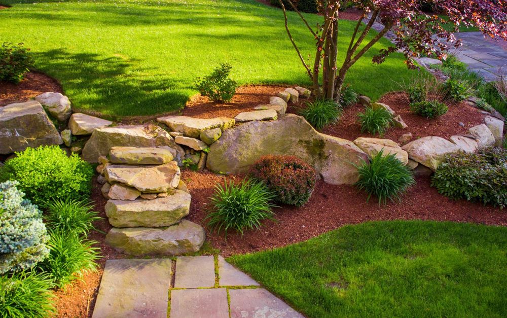 Enhance your garden's health and appearance with our professional mulch installation service. We efficiently lay premium mulch to conserve moisture, suppress weeds, and enrich soil for thriving landscape vitality. for Hays Lawn and Property Services in Clinton, TN