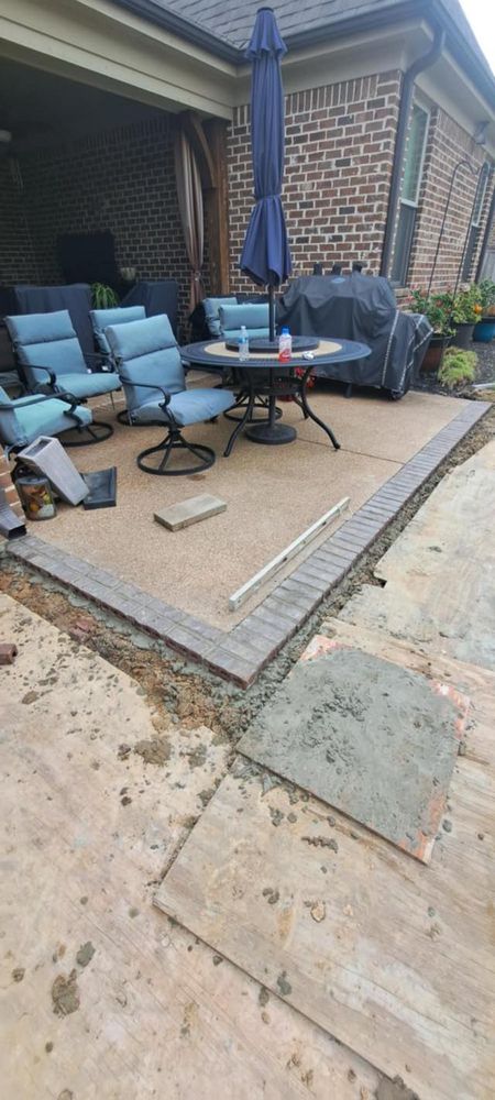 Transform your backyard with our professional outdoor kitchen construction service. We specialize in concrete slab construction, ensuring a durable and stylish foundation for your ultimate cooking experience outdoors. for Sam's Concrete & Masonry in Hernando, MS