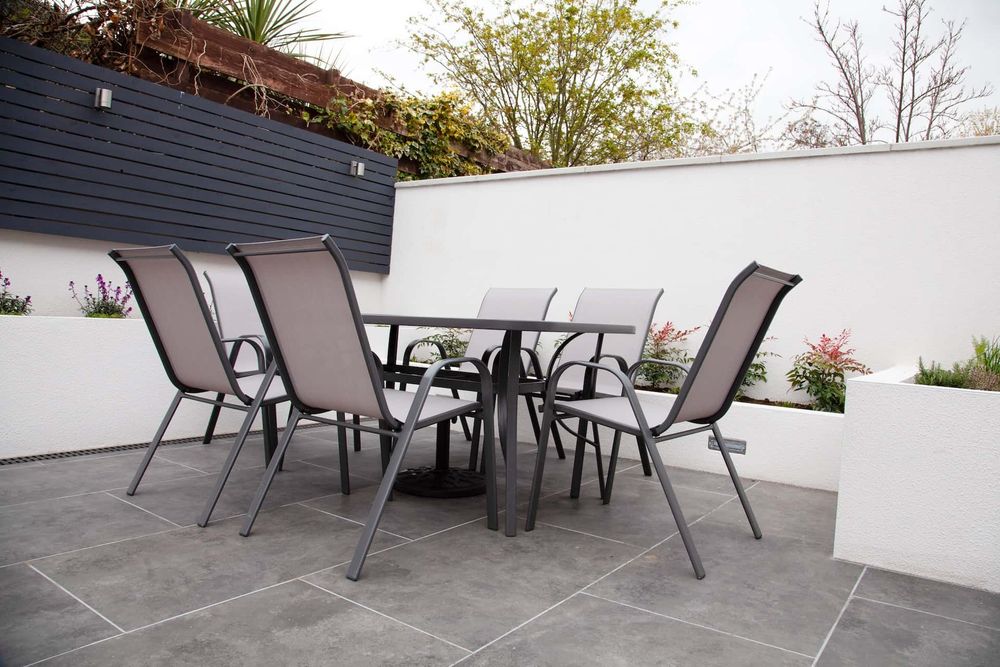 Transform your outdoor space with our expert patio design and installation service. We offer customized concrete solutions, ensuring durability and style to enhance your home's aesthetic appeal and functionality. for H.T.S CONSTRUCTION LLC in Anchorage, AK