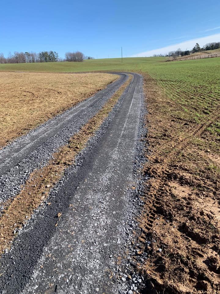 Our Roadbeds service ensures durable, stable foundations for driveways and private roads, enhancing safety and longevity. Let our expert team provide precise excavation tailored to your property’s unique needs. for Sprouse’s Hauling and Excavating in Craigsville, VA