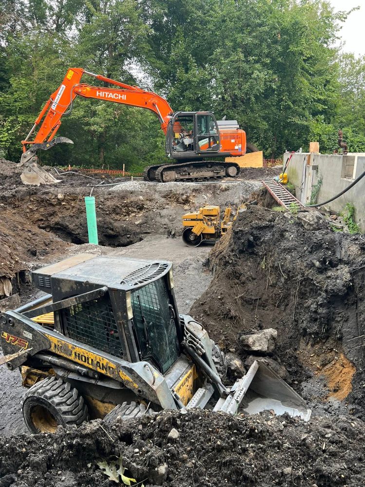 Our demolition services safely remove unwanted structures, concrete, and debris with precision equipment and experienced crews, preparing your property for new construction, excavation, landscaping improvements, or complete site redevelopment. for Redwood Construction in Cranston, RI