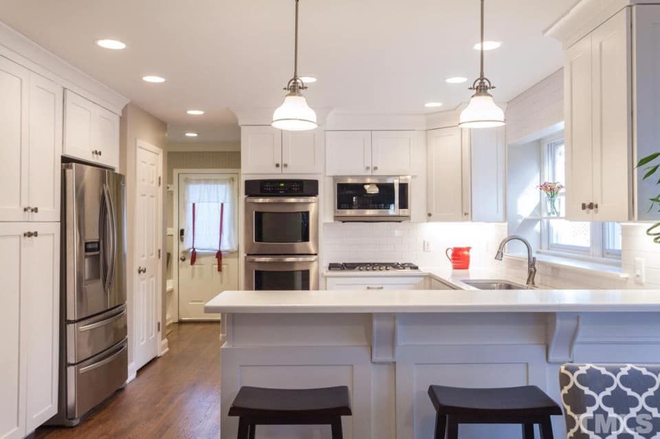 Our Kitchen Renovation service provides top-notch craftsmanship to transform your kitchen into a modern, stylish space that you'll love. for Wind Rose Construction in Raleigh, NC